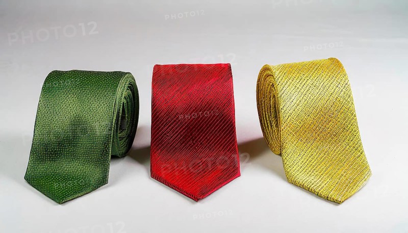 Symbol photo, traffic light, three ties, one each in red, green and yellow, on a white surface, AI generated, AI generated