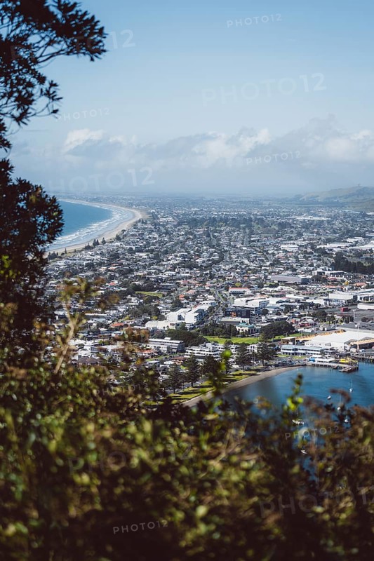 View from the viewpoint of Mount Manganui with a view of the sea and the city. Taken in Tauranga, New Zealand, Oceania