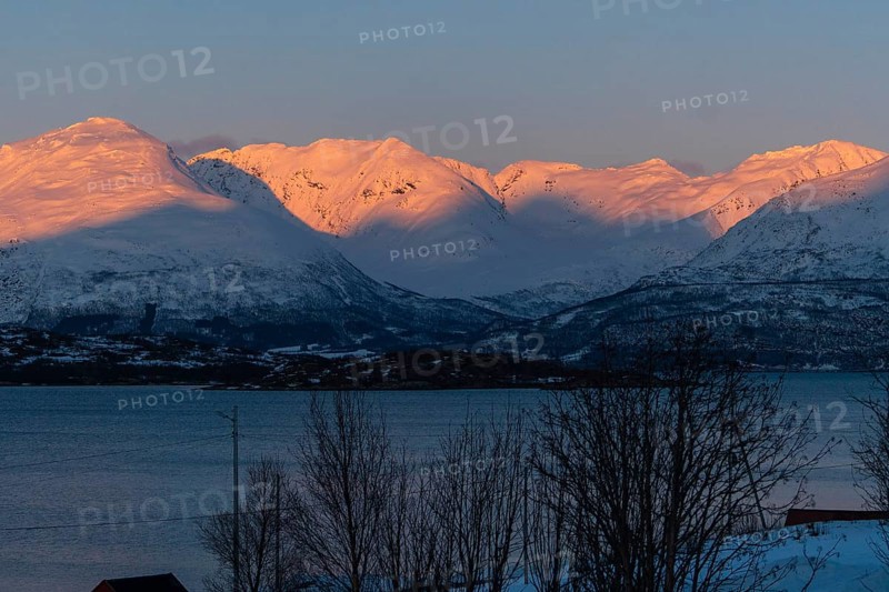 Sunset in the Lyngenfjord with a view of Sorbmegaisa, Norway, Europe