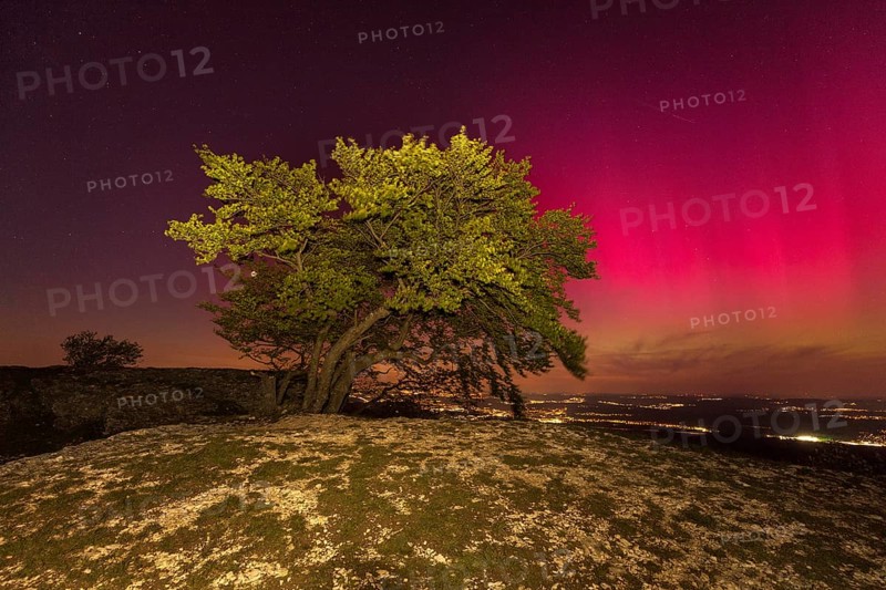 Aurora Borealis in Germany. Very strong aurora borealis over the Stuttgart metropolitan region. View from Breitenstein near Ochsenwang on the Swabian Alb, from 10.05.2024. View towards Stuttgart