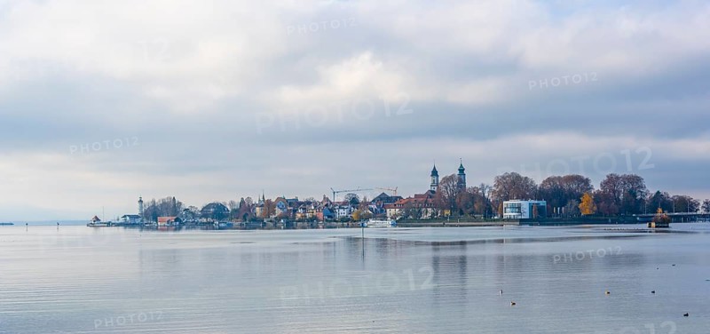 View over the lake to the village of Lindau Island with church towers, Lindau, Lake Constance, Bavaria, Germany, Europe