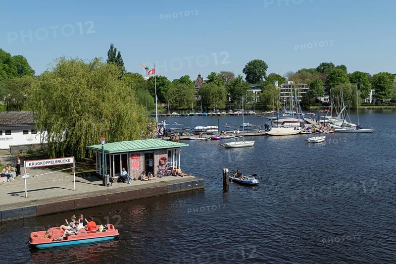 Symbolic picture weather, leisure activity, summery spring, Krugkoppelbruecke jetty, sailing boats, rowing boats and pedal boats against a blue sky on the Alster in Hamburg, Germany, Europe