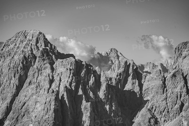 Spectacular rocky mountain peaks of the Sesto Dolomites, black and white, view from the Carnic Main Ridge, Carnic High Trail, Carnic Alps, Carinthia, Austria, Europe