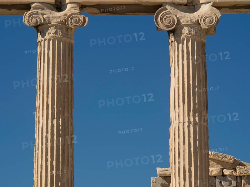 Close-up of ancient marble columns and their details against a clear blue sky, historical columns and ruins at an ancient site against a blue sky, Athens, Greece, Europe