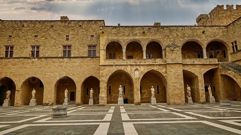 Large courtyard of a castle with statues and a chequered floor pattern, sky replaced, courtyard, Grand Master's Palace, Knights' Town, Rhodes Town, Rhodes, Dodecanese, Greek Islands, Greece, Europe