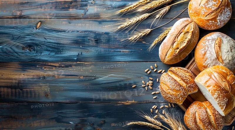 Variety of fresh loaf of bread and wheat on a rustic table with a lot of copy space, AI generated