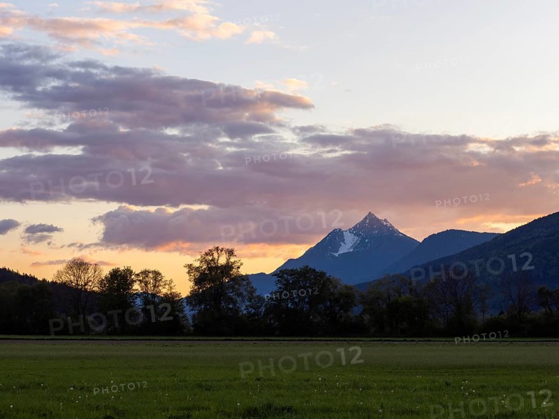 Evening clouds over mountain peak, Kammspitze, near Irdning, Ennstal, Styria, Austria, Europe