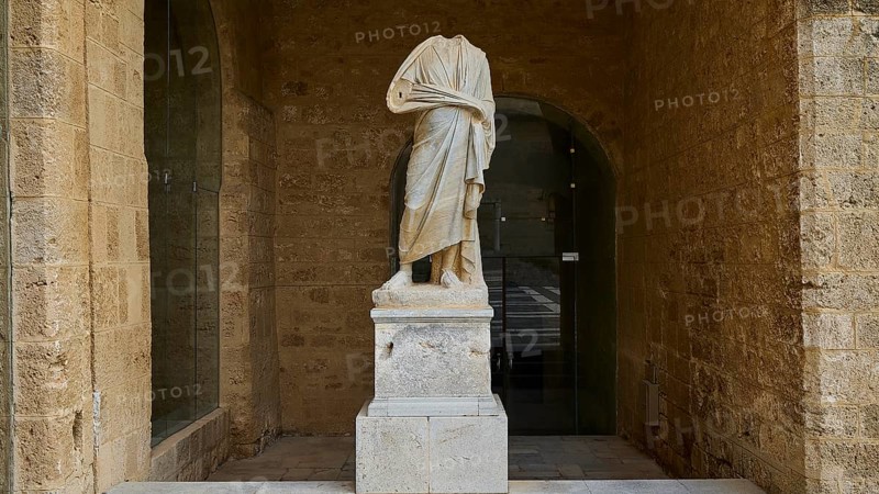Statue without head and arms on a column in a niche, courtyard, torso of a Roman statue, Grand Master's Palace, Knights' Town, Rhodes Town, Rhodes, Dodecanese, Greek Islands, Greece, Europe