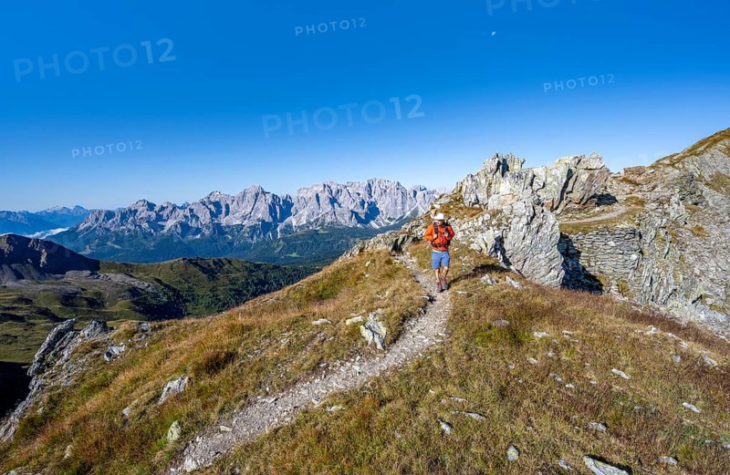 Mountaineers on a hiking trail, old war positions from the First World War, mountain panorama, view of rocky mountain peaks of the Sesto Dolomites, Carnic Main Ridge, Carnic High Trail, Carnic Alps, Carinthia, Austria, Europe