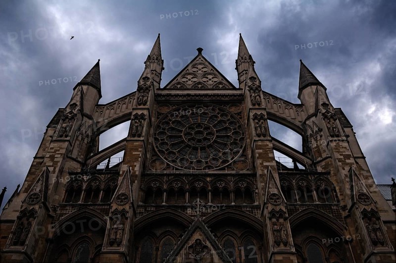 Gothic side portal (detail) of Westminster Abbey in rainy weather, Dean's Yard, London, England, Great Britain