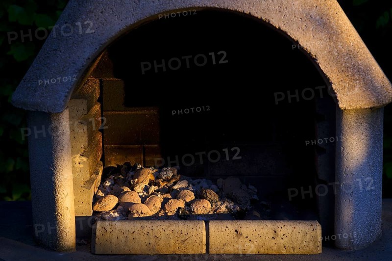 Outdoor photo, ash, charcoal, briquettes, coal, charcoal residue, not completely burnt, lying in a barbecue, garden barbecue, Stuttgart, Baden-Wuerttemberg, Germany, Europe