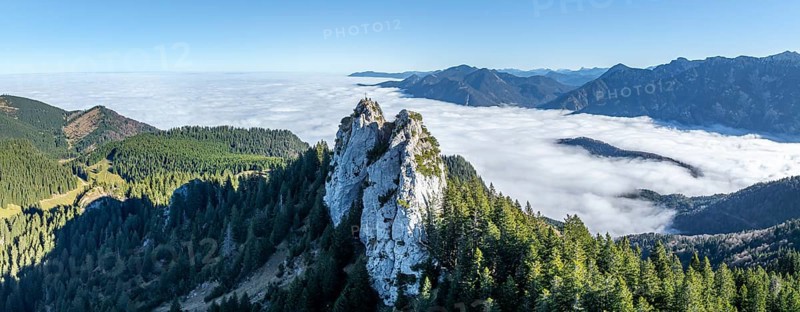 Aerial view, rocky summit of the Ettaler Manndl, view over mountain landscape and sea of clouds, high fog in the valley, Ammergau Alps, Bavaria, Germany, Europe