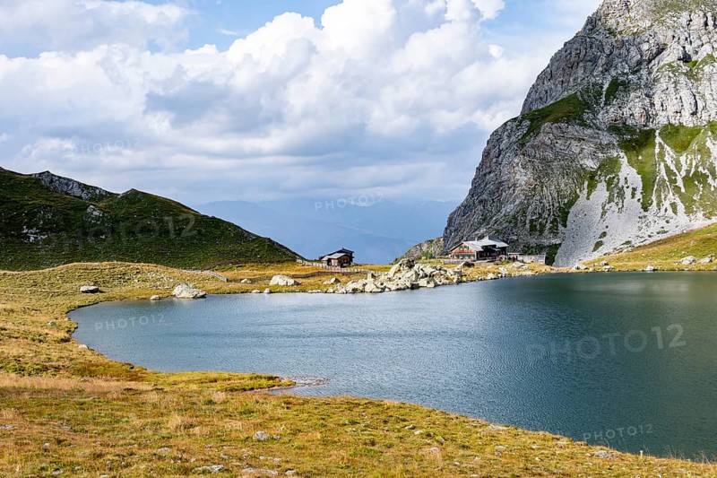 Obstanserseehuette mountain hut on the Obstansersee mountain lake, Carnic main ridge, Carnic High Trail, Carnic Alps, Carinthia, Austria, Europe