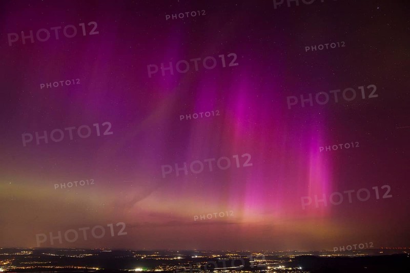 Aurora Borealis in Germany. Very strong aurora borealis over the Stuttgart metropolitan region. View from Breitenstein near Ochsenwang on the Swabian Alb, from 10.05.2024. View in north-east direction
