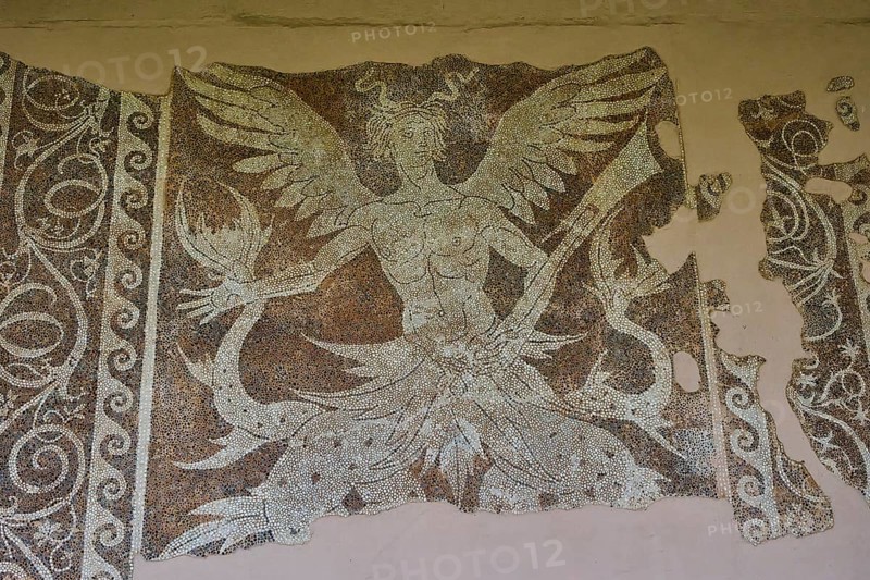 Damaged ancient mosaic with a winged mythological figure of Triton, god of the sea, and decorative patterns, outdoor area, Archaeological Museum, Old Town, Rhodes Town, Rhodes, Dodecanese, Greek Islands, Greece, Europe