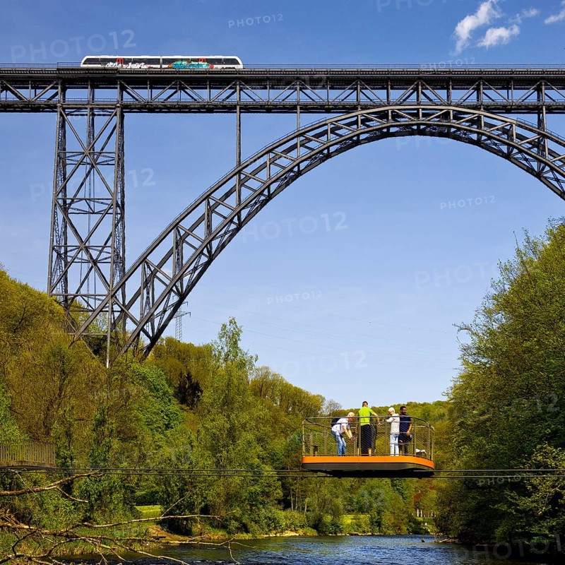 Muengsten Bridge with diesel railcar and transporter bridge over the Wupper, Solingen, Bergisches Land, North Rhine-Westphalia, Germany, Europe