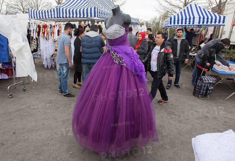 A Turkish stall offers wedding dresses at the flea market in Gelsenkirchen, on 12/04/2015, Gelsenkirchen, North Rhine-Westphalia, Germany, Europe