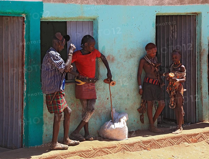 South Ethiopia, Omo region, in the village of Turmi, people standing in front of a house, the tribe of the Hamar, Hamer, Hamma, Hammer, Amar or Amer, Ethiopia, Africa