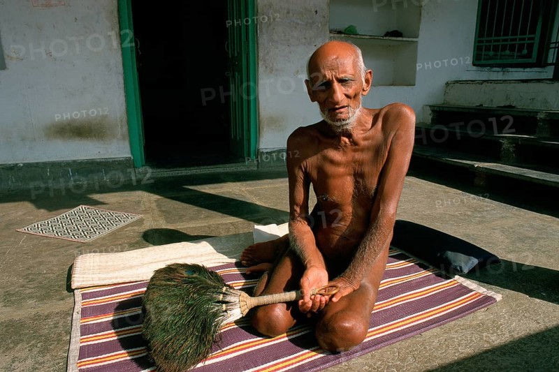 Jain monk sitting in front of the cell where he is staying at that time, portrait of a naked monk from the digambar order, Rajasthan, India, Asia