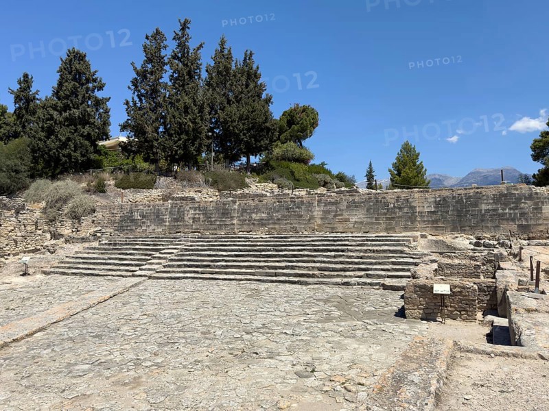 View of historical square from antiquity with in the background large open staircase on wall staircase so-called theatre area in excavation site of Minoan culture of pre-Greek ancient Greek people Minoans, hill of Phaistos, Kamilari, Crete, Greece, Europe