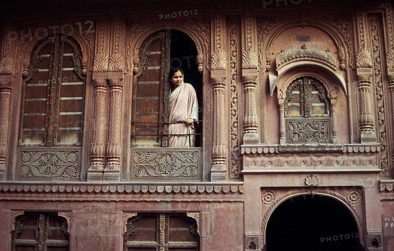 Facade of a Haveli, urban mansion with architectural significance at Bikaner, Rajasthan, India. Beautiful house made of sandstone in the old town