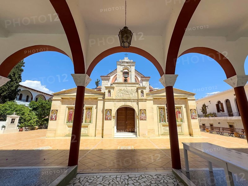 View through archway to main entrance portal of orthodox church monastery church Zoodochos Pege in Byzantine style from 14th century in today's nunnery monastery of Panagia Kalyviani Kaliviani, Faneromeni, Tymbaki, Crete, Greece, Europe