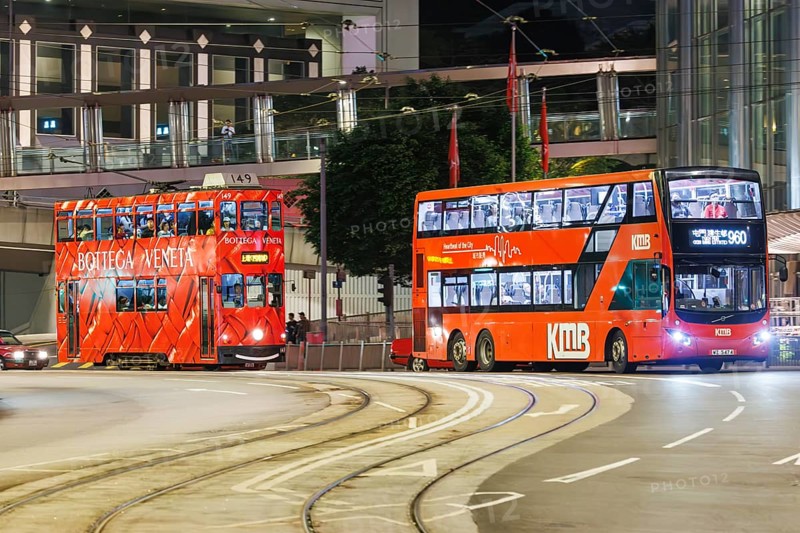 Hong Kong Tramway double-decker tram and bus public transport on Des Voeux Rd in Hong Kong, China, Asia