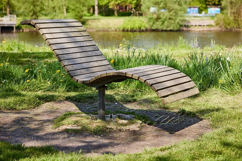 Wooden public deckchair in Friedrichstadt, Nordfriesland district, Schleswig-Holstein, Germany, Europe
