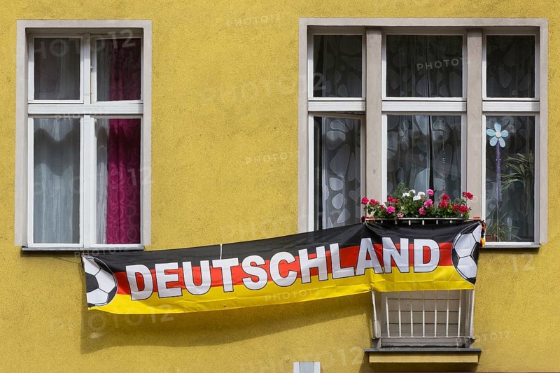 A German national team football fan decorated his balcony with a German flag for the 2014 World Cup, Berlin, 2 July 2014