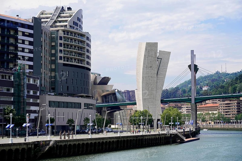 On the road in Bilbao, Province of Bizkaia, Basque Country, Spain, Europe, Modern cityscape with striking buildings and a bridge, Old Town, Bilbao, Europe