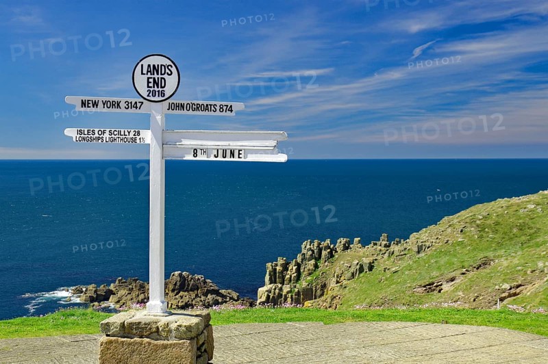 Signpost at Lands End, cliffs and sea, New York, John O Groats, Cornwall, Great Britain