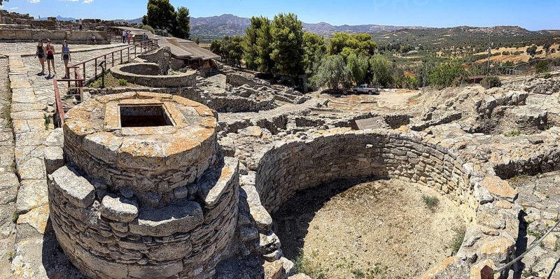 View of Kouloures so-called rings in earth embedded large brick-built round storage tanks in area of Old Palace in excavation site of Minoan culture of pre-Greek ancient Greek people Minoans, hill of Phaistos, Kamilari, Crete, Greece, Europe