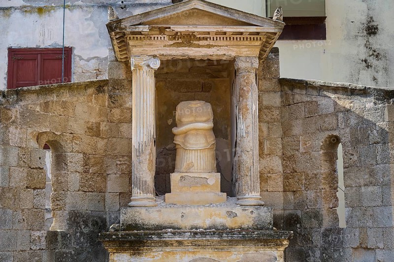 Doric columns at a historical site, temple pediment, sculpture with snake, shows signs of weathering, outdoor area, Archaeological Museum, Old Town, Rhodes Town, Rhodes, Dodecanese, Greek Islands, Greece, Europe