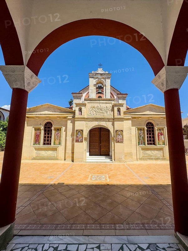 View through archway to main entrance portal of orthodox church monastery church Zoodochos Pege in Byzantine style from 14th century in today's nunnery monastery of Panagia Kalyviani Kaliviani, Faneromeni, Tymbaki, Crete, Greece, Europe