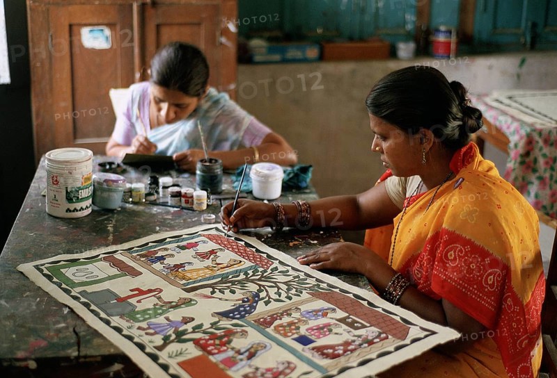 Two women painting mithila art, working in a handicraft centre, Janakpur, Nepal, Asia