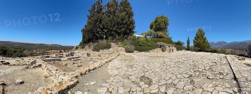 View of upper part of settlement of Phaistos with upper square courtyard open space court left next to foundation walls, ground find of ancient complex of palace of Phaistos of Minoan culture of pre-Greek people Minoans in antiquity, Kamilari, Crete, Greece, Europe