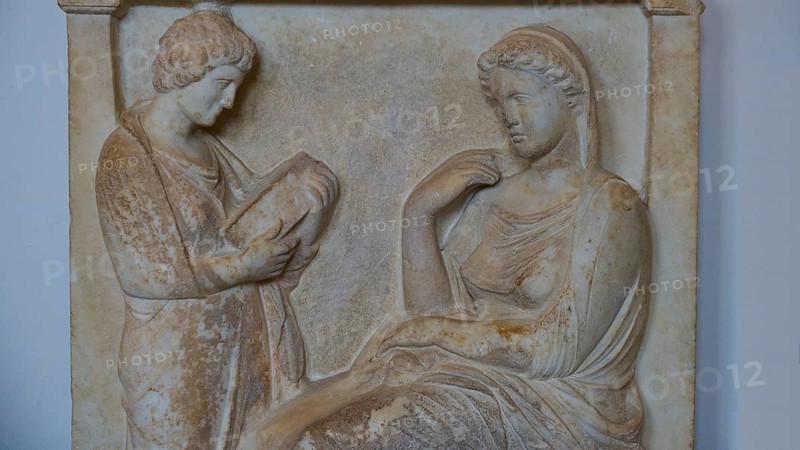 Tomb stele from Kalliarista, Dead seated woman and standing servant, A stone relief shows two figures conversing in classical style, Interior, Archaeological Museum, Old Town, Rhodes Town, Rhodes, Dodecanese, Greek Islands, Greece, Europe