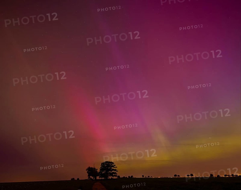 Strong coronal mass ejections on the sun have sent correspondingly intense storms of charged particles towards the earth, where they have also caused auroras over Germany. These auroras occur at an altitude of 70 to 800 kilometres in the atmosphere when the electrically charged particles of the solar wind stimulate the molecules in the atmosphere to emit light of a certain wavelength. Here on the southern outskirts of Dresden at the Babisnauer Pappel, Rippien, Saxony, Germany, Europe