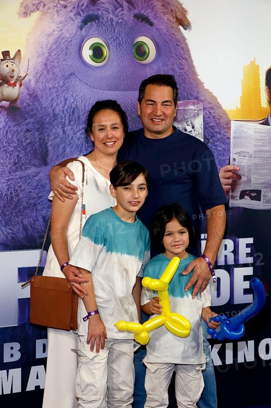 Buelent Sharif with woman Emy and sons Batuhan and Timucin-Khan at the special screening of IF: IMAGINARY FRIENDS at Berlin's CinemaxX cinema on 12 May 2024