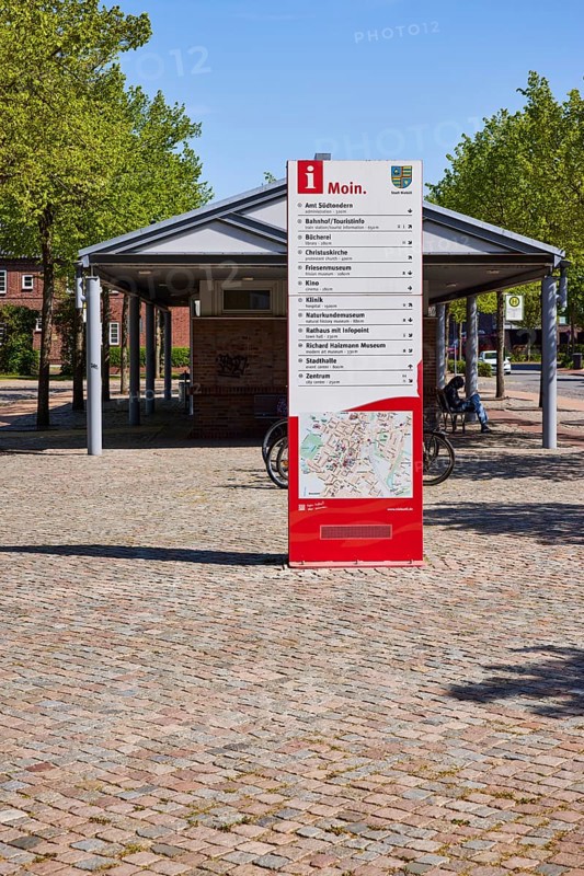 Signposts to various institutions and museums at the bus station in Niebuell, Nordfriesland district, Schleswig-Holstein, Germany, Europe