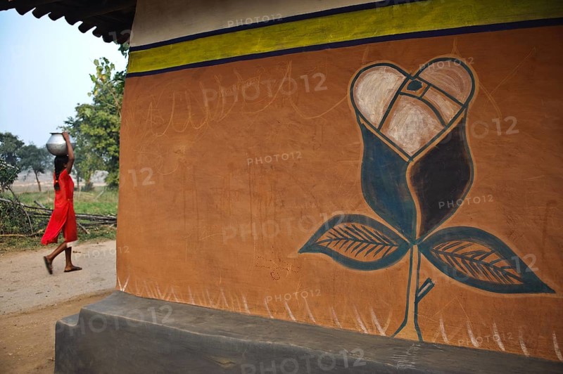 Traditional mural painting on the wall of a house, village inhabited by Santhal tribespeople, West Bengal, India, Asia