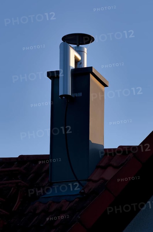 Retrofitted chimney on roof, with dust separator, electrostatic filtering of soot particles from the inside of the flue pipe, power connection, building services, Stuttgart, Baden-Wuerttemberg