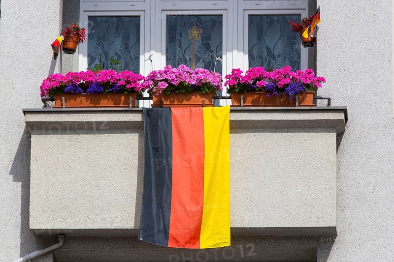 A German national team football fan decorated his balcony with a German flag for the 2014 World Cup, Berlin, 2 July 2014