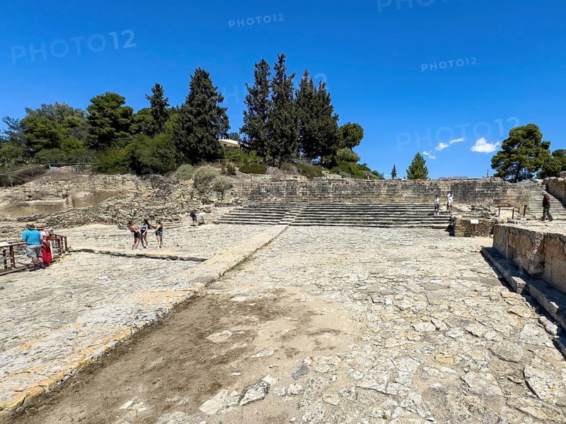 View of historical square from antiquity with in the background large open staircase on wall staircase so-called theatre area in excavation site of Minoan culture of pre-Greek ancient Greek people Minoans, hill of Phaistos, Kamilari, Crete, Greece, Europe