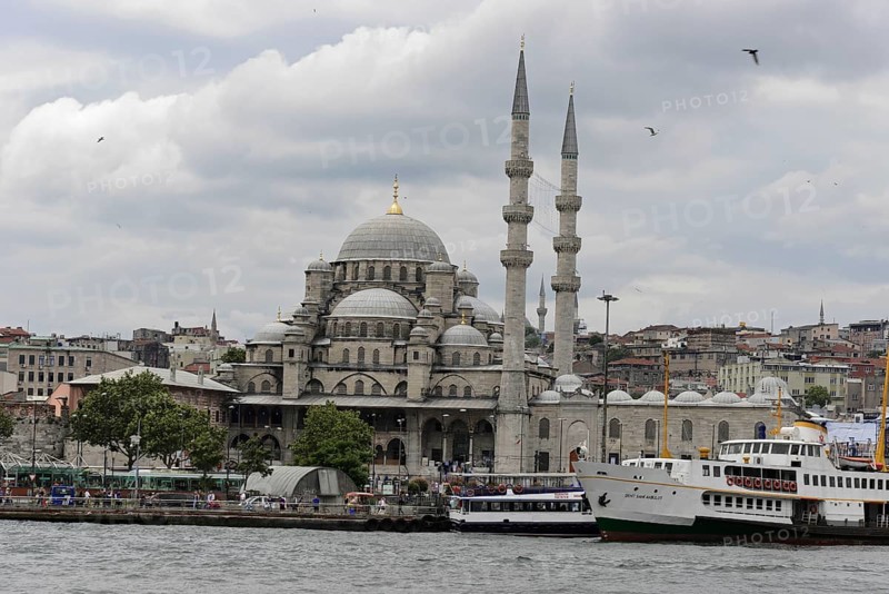 View of the New Mosque on the shore with ships and flying birds, Istanbul, Istanbul Province, Turkey, Asia