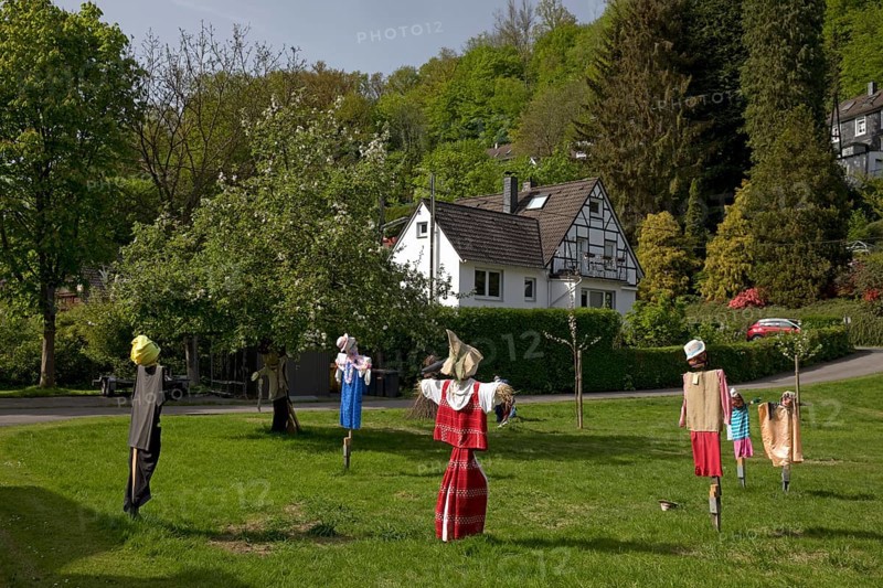 Scarecrows at the parish hall of the Protestant church in Unterburg, Solingen, Bergisches Land, North Rhine-Westphalia