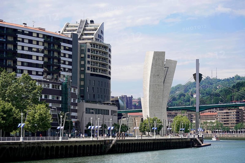 On the way in Bilbao, province Bizkaia, Basque Country, Spain, Europe, Promenade at a river Nervion, with modern skyscrapers and a wide street, old town, Bilbao, Europe
