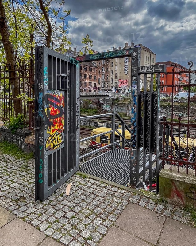 Germany, Berlin, 26.04.2024, Ringbahn trench of the S-Bahn, open service gate, S-Bahn, view to Schoenfliesser Bruecke, (rear building) gable of Kopenhagener Strasse, Europe