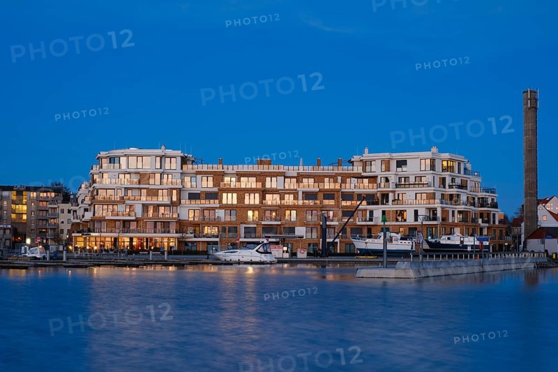 Apartment building on Lake Mueritz, Blue Hour, Waren, Mueritz, Mecklenburg Lake District, Mecklenburg, Mecklenburg-Vorpommern, Germany, Europe