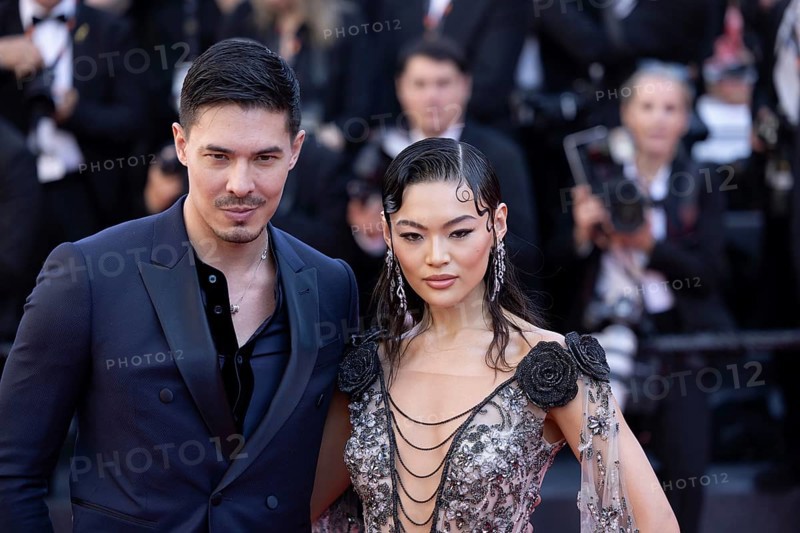 Cannes, France, 17.5.2024: Lewis Tan and Lucy Qiu at the premiere of Kinds of Kindness on the red carpet of the Palais des Festivals during the 77th Cannes International Film Festival. The 77th Cannes International Film Festival will take place from 14 to 25 May 2024, Europe